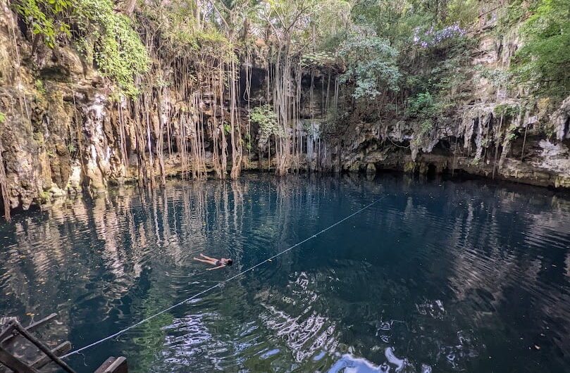 Turquoise waters of a cenote in the Riviera Maya